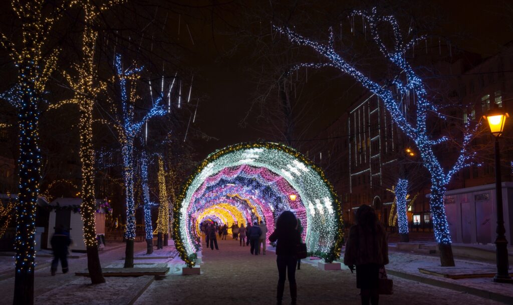 Glowing Christmas Lights And Trees With Multiple Colors