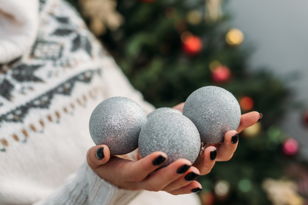 Girl Holding Balls